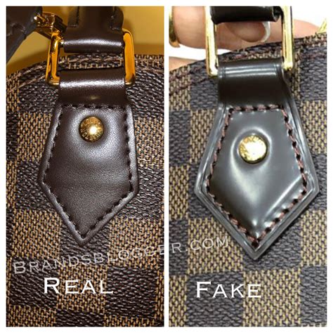 louis vuitton alma real vs fake